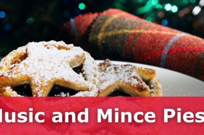 Mince pies on a plate with a Christmas tree in the background and a tartan blanket folded. Text reads: Music and Mince Pies.