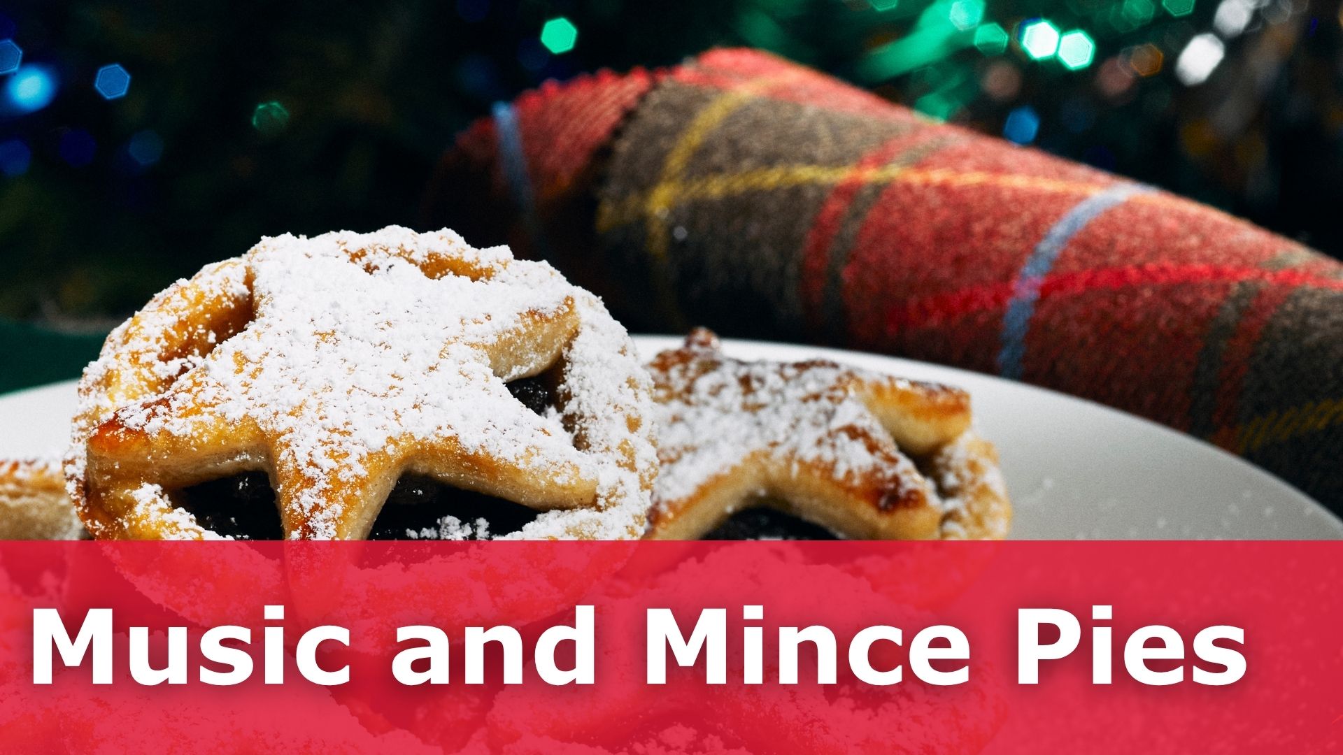 Mince pies on a plate with a Christmas tree in the background and a tartan blanket folded. Text reads: Music and Mince Pies.